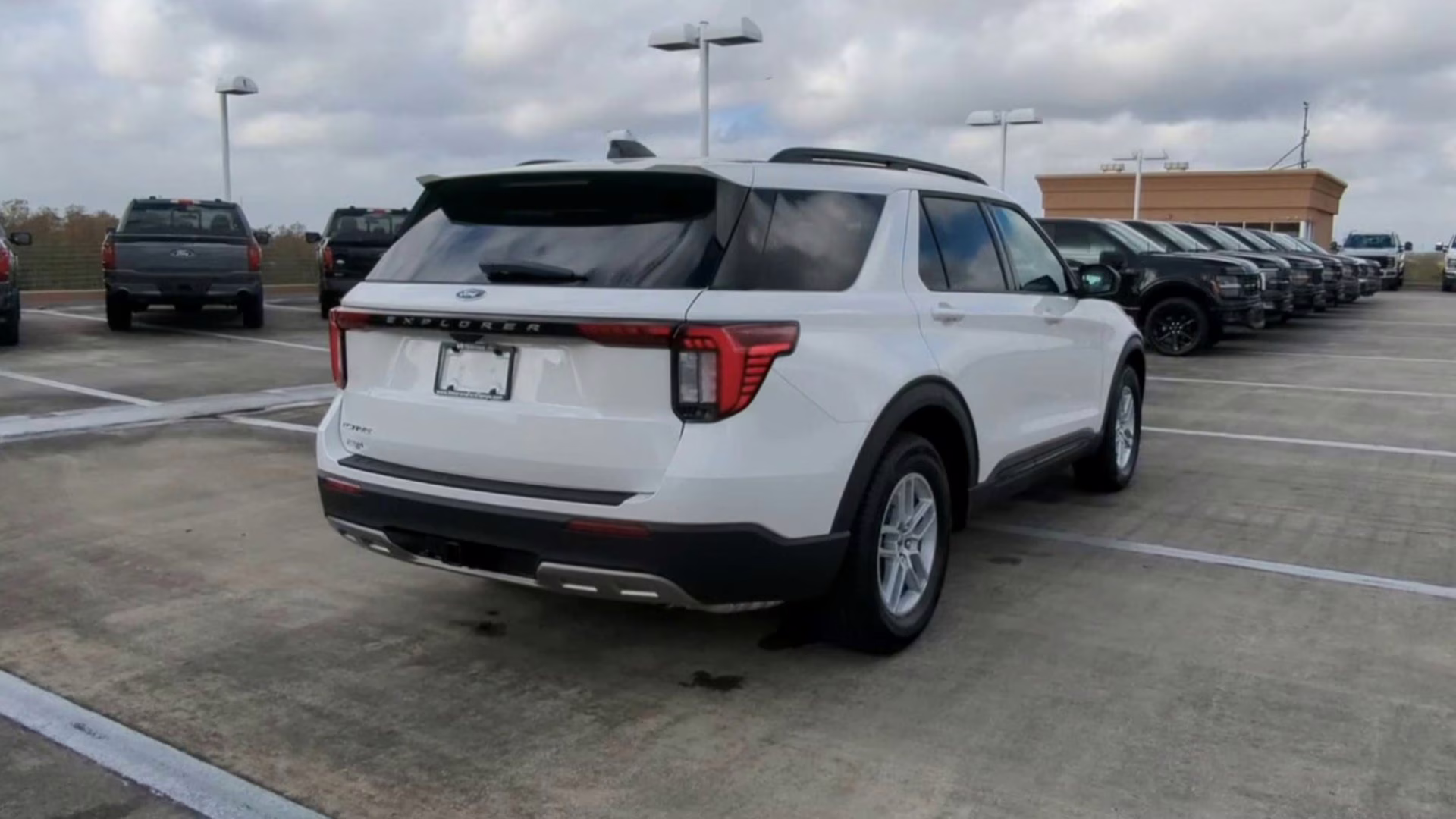 2026 Star White Metallic Tri-Coat Ford Explorer Active RWD SUV