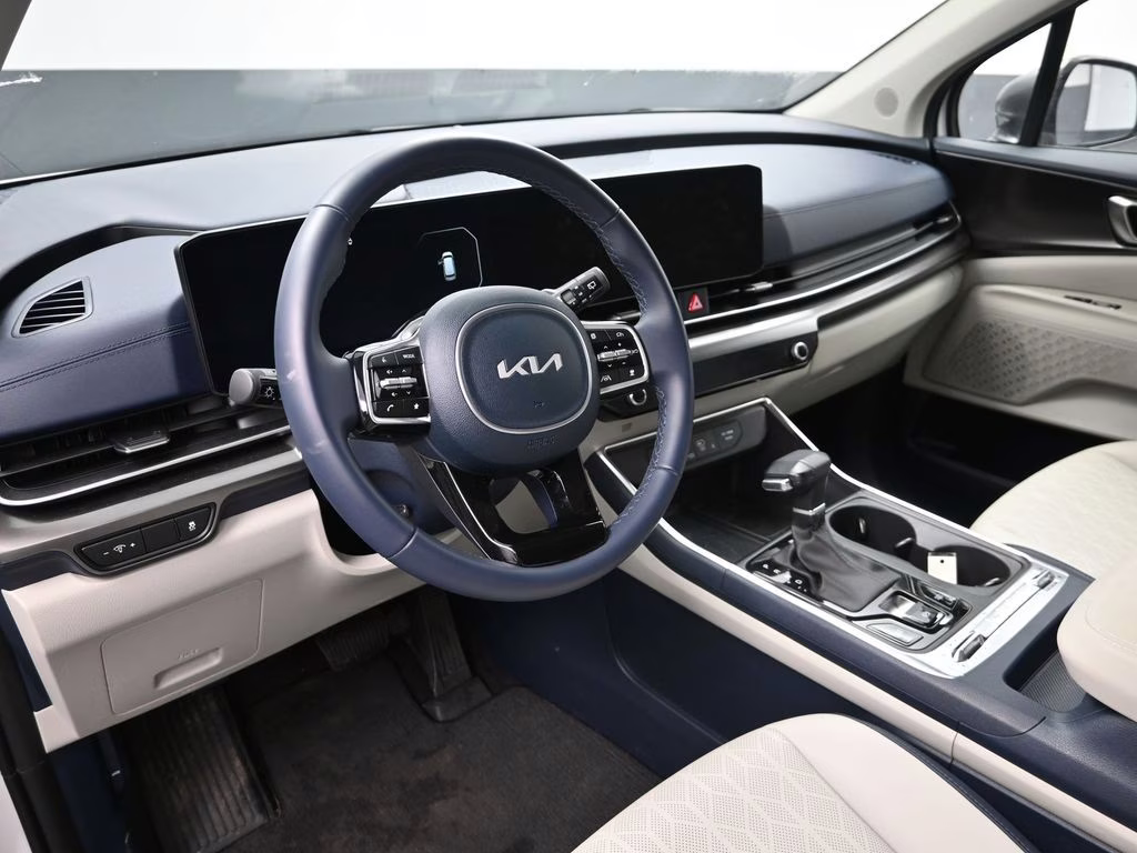 2025 Snow White Pearl Kia Carnival SX FWD Van