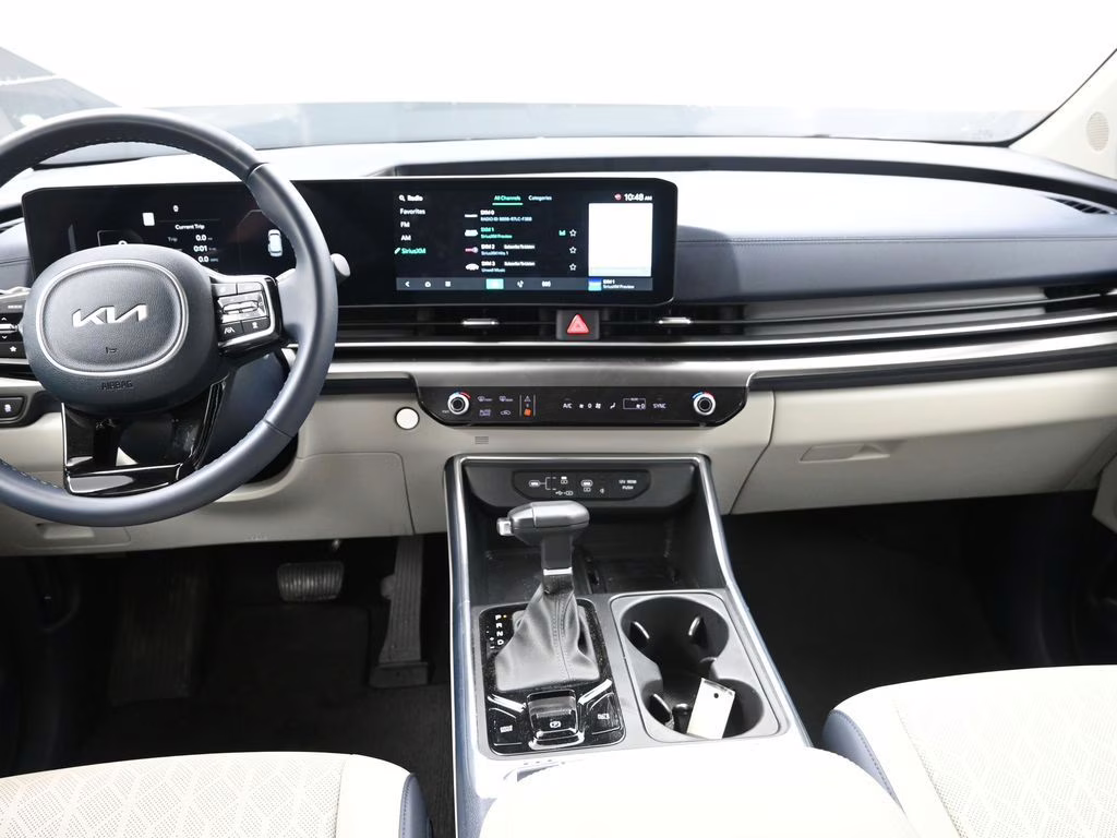 2025 Snow White Pearl Kia Carnival SX FWD Van