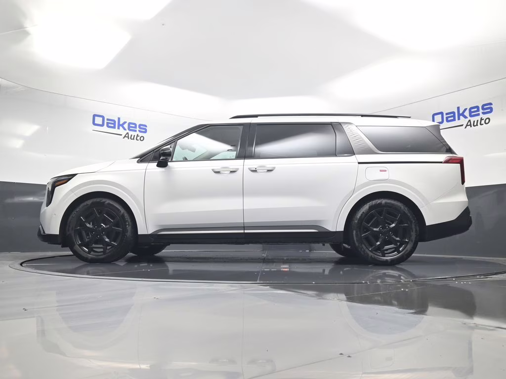 2025 Snow White Pearl Kia Carnival SX FWD Van