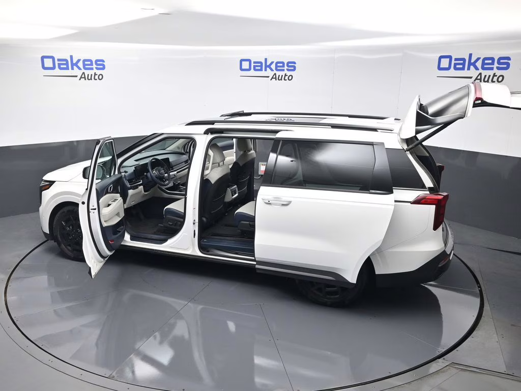 2025 Snow White Pearl Kia Carnival SX FWD Van
