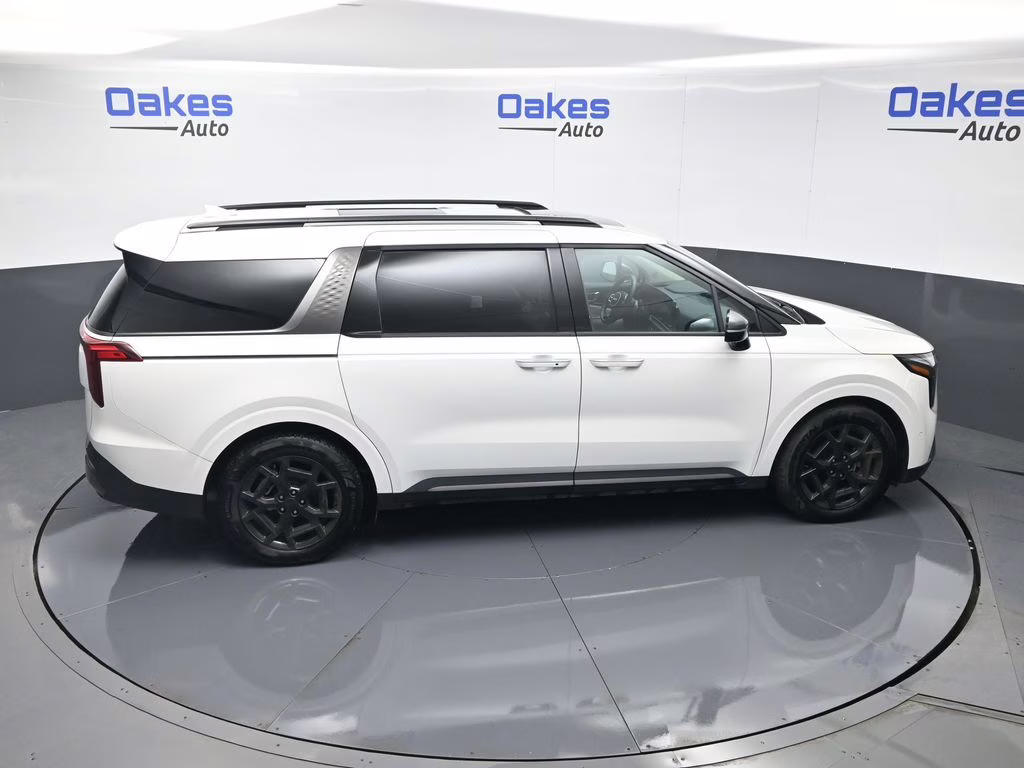 2025 Snow White Pearl Kia Carnival SX FWD Van