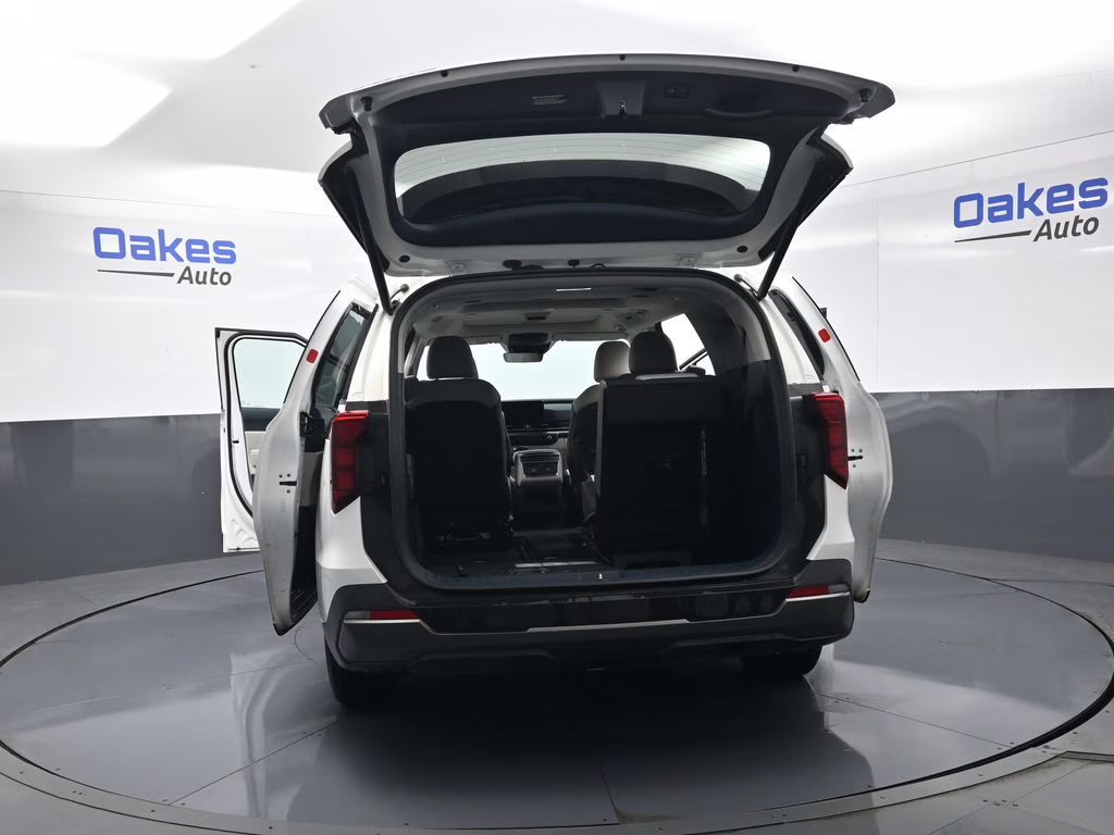 2025 Snow White Pearl Kia Carnival SX FWD Van
