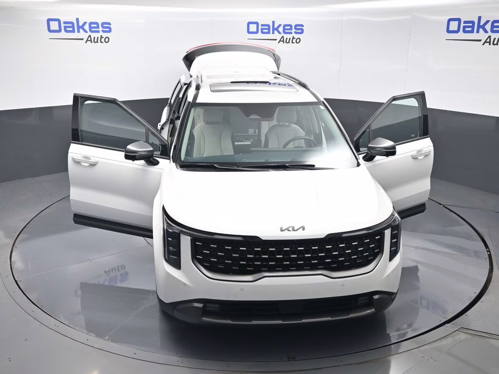 2025 Snow White Pearl Kia Carnival SX FWD Van