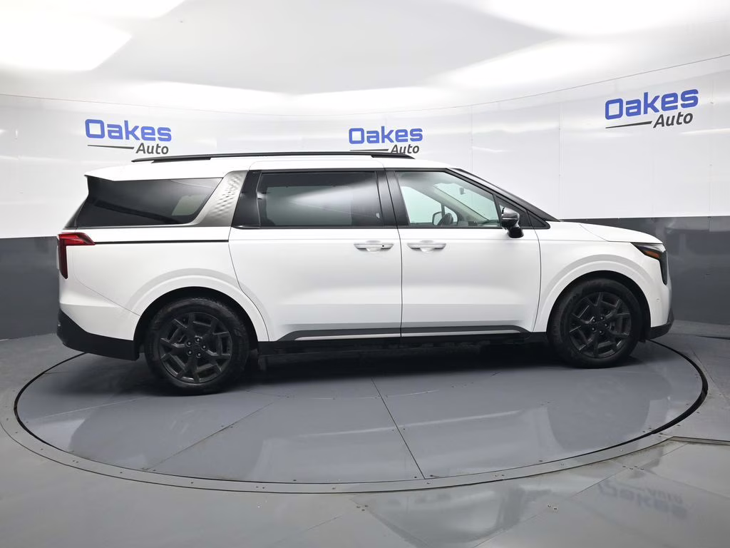 2025 Snow White Pearl Kia Carnival SX FWD Van