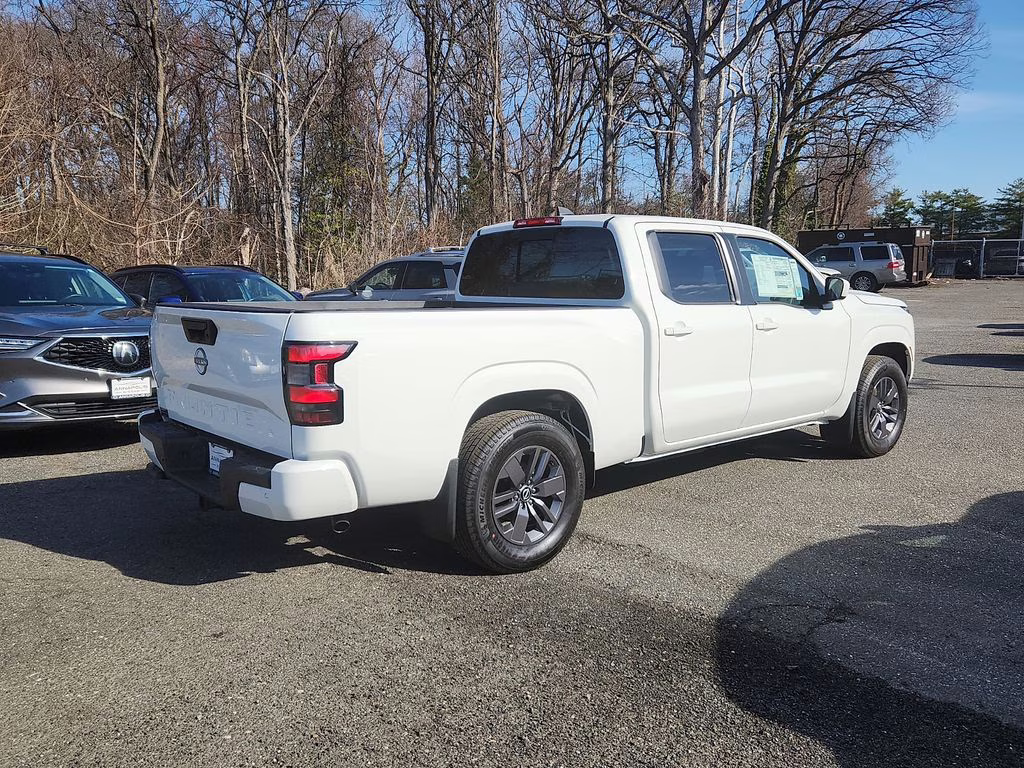 2026 Glacier White Nissan Frontier SV RWD Truck