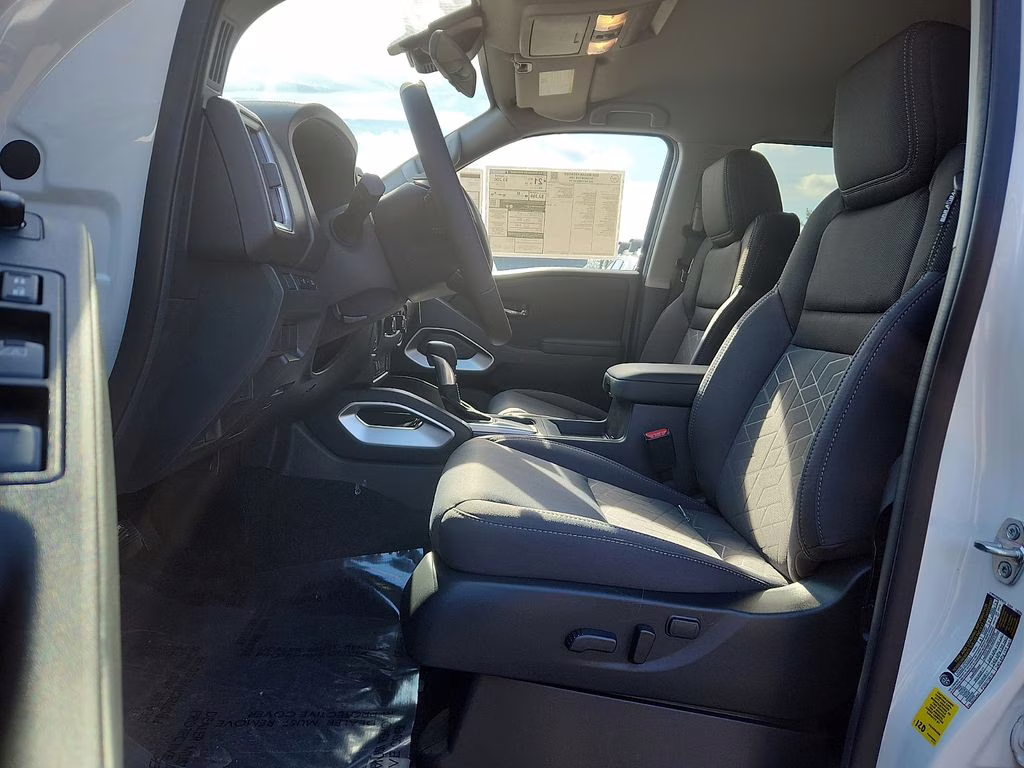 2026 Glacier White Nissan Frontier SV RWD Truck