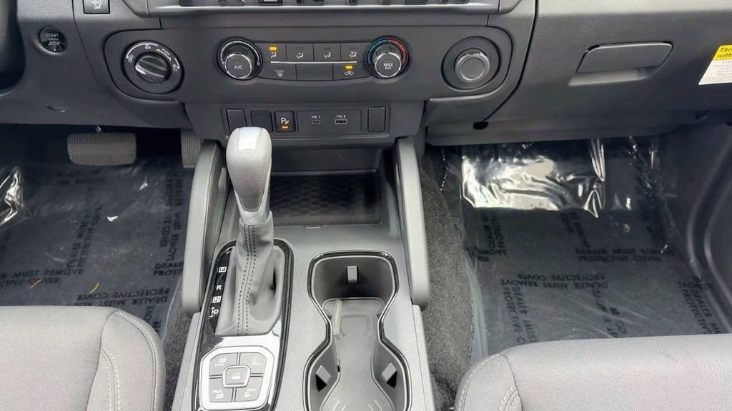 2026 Glacier White Nissan Frontier SV 4X4 Truck