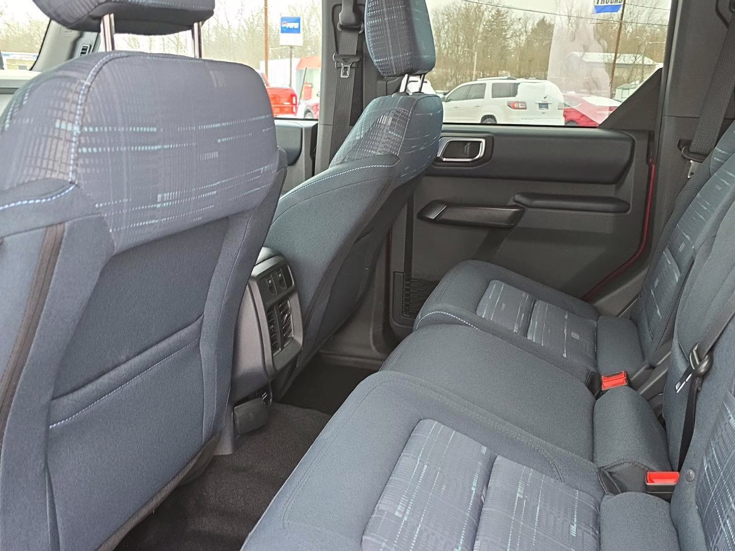 2025 Ruby Red Metallic Tinted Clearcoat Ford Bronco Heritage Edition 4X4 SUV