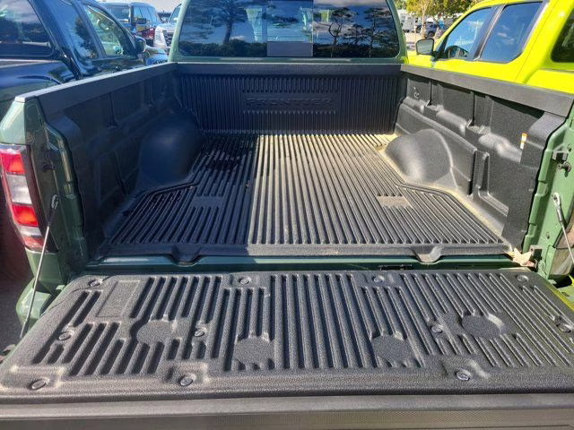 2025 Green Metallic Nissan Frontier PRO-4X 4X4 Truck