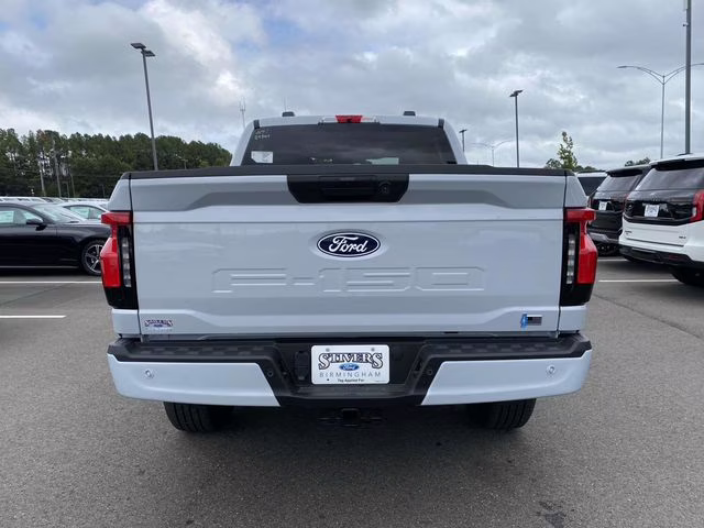 2025 Space White Metallic Ford F-150 Lightning Flash AWD Truck