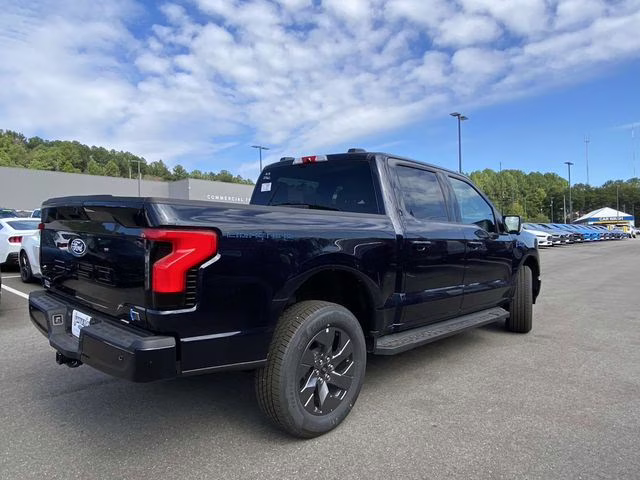2025 Antimatter Blue Metallic Ford F-150 Lightning Flash AWD Truck