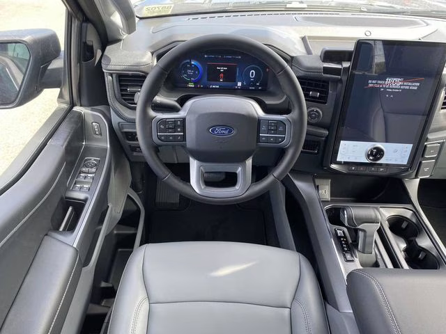 2025 Antimatter Blue Metallic Ford F-150 Lightning Flash AWD Truck