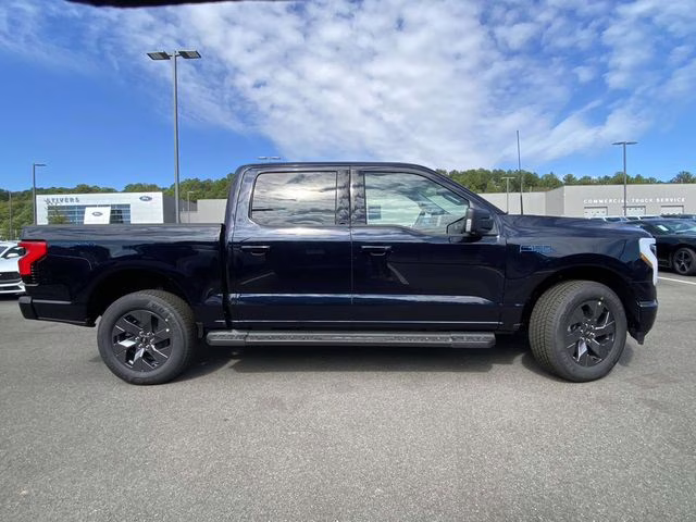 2025 Antimatter Blue Metallic Ford F-150 Lightning Flash AWD Truck