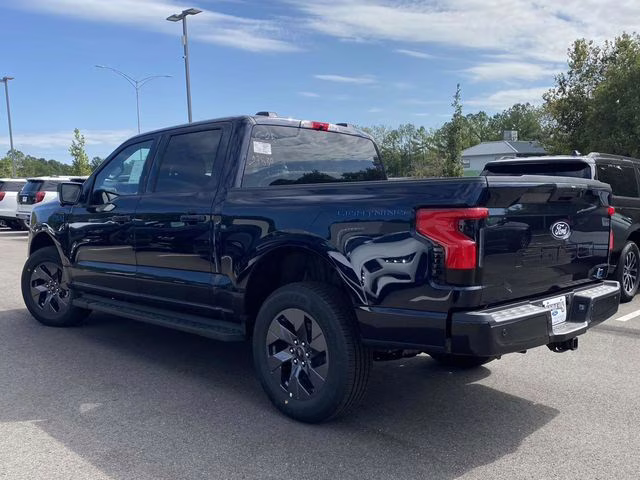 2025 Antimatter Blue Metallic Ford F-150 Lightning Flash AWD Truck