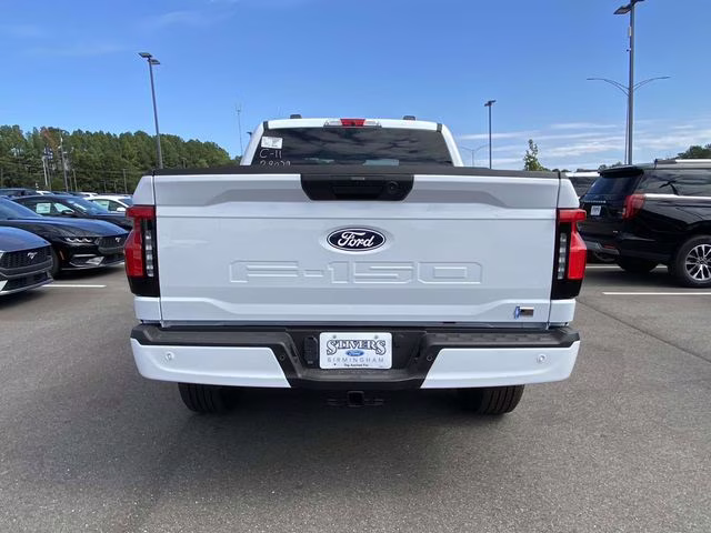 2025 Oxford White Ford F-150 Lightning Flash AWD Truck