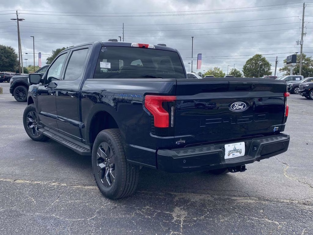 2025 Antimatter Blue Metallic Ford F-150 Lightning Flash AWD Truck