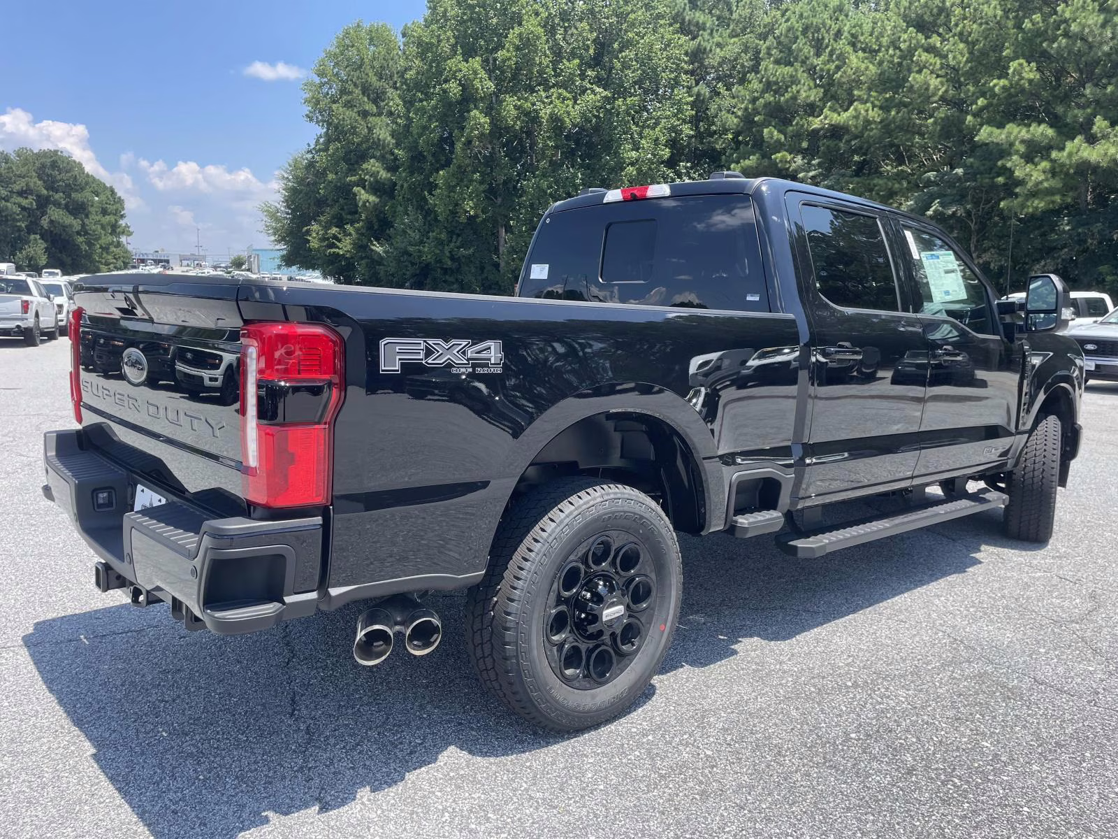 2025 Agate Black Metallic Ford Super Duty F-250 SRW Lariat 4X4 Truck