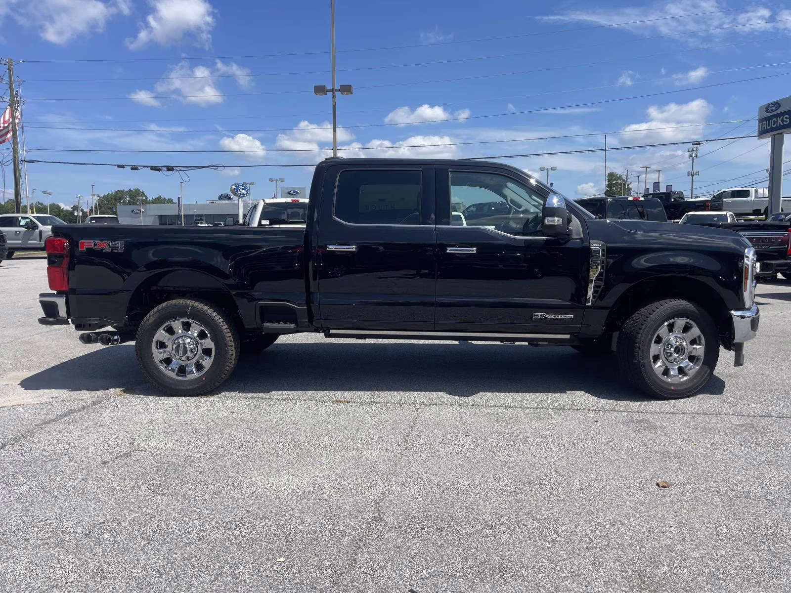 2025 Black Metallic Ford Super Duty F-350 SRW Lariat 4X4 Truck