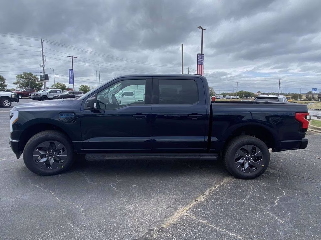 2025 Antimatter Blue Metallic Ford F-150 Lightning Flash AWD Truck