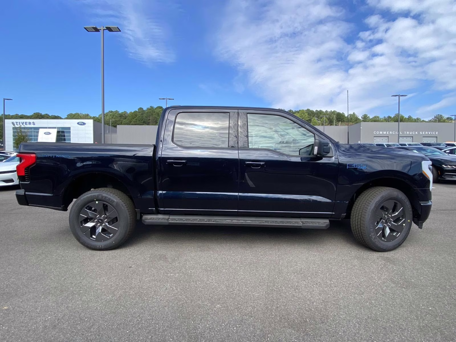 2025 Antimatter Blue Metallic Ford F-150 Lightning Flash AWD Truck