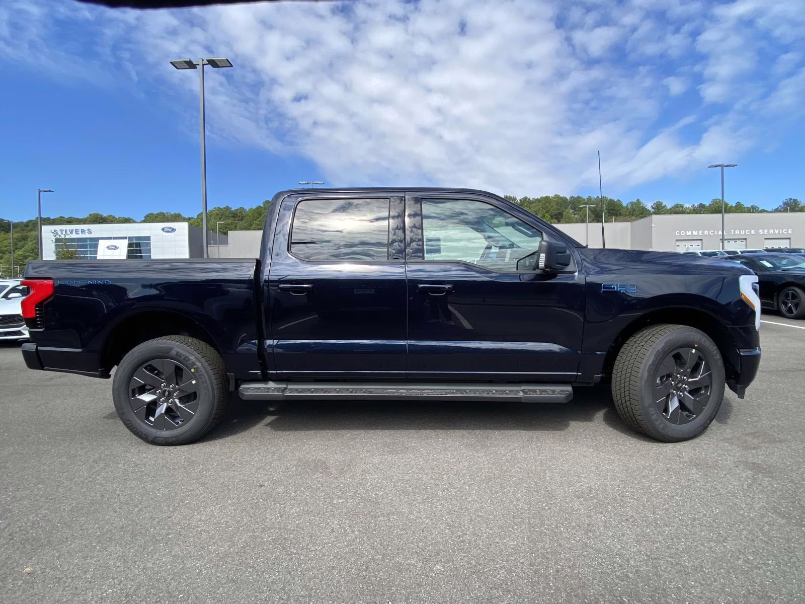 2025 Antimatter Blue Metallic Ford F-150 Lightning Flash AWD Truck