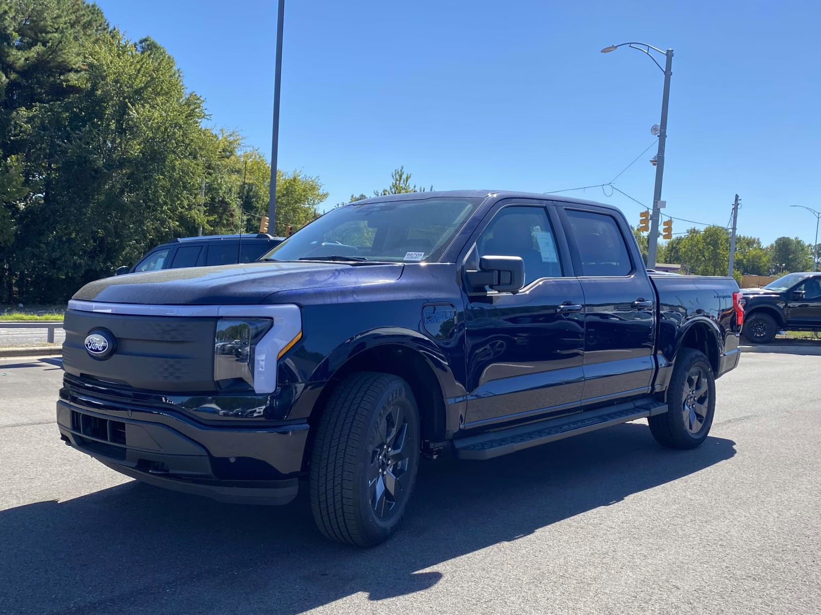 2025 Antimatter Blue Metallic Ford F-150 Lightning Flash AWD Truck