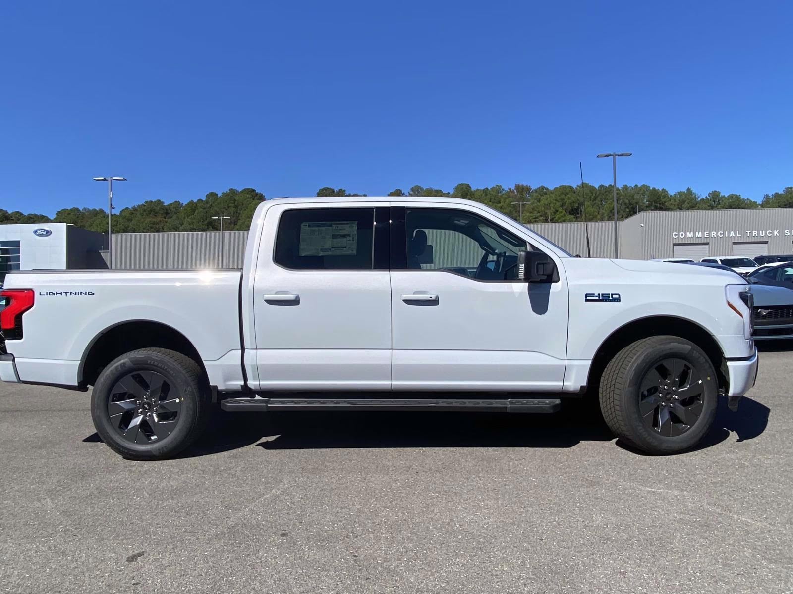 2025 Space White Metallic Ford F-150 Lightning Flash AWD Truck