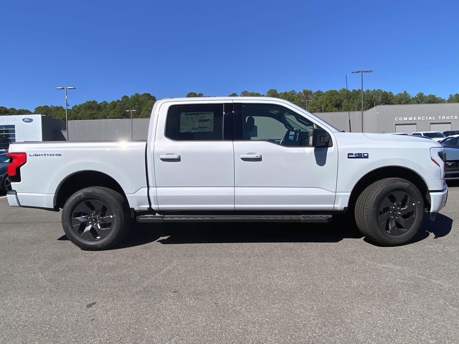 2025 Space White Metallic Ford F-150 Lightning Flash AWD Truck