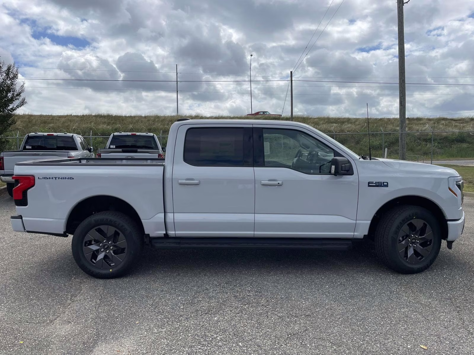 2025 Space White Metallic Ford F-150 Lightning Flash AWD Truck