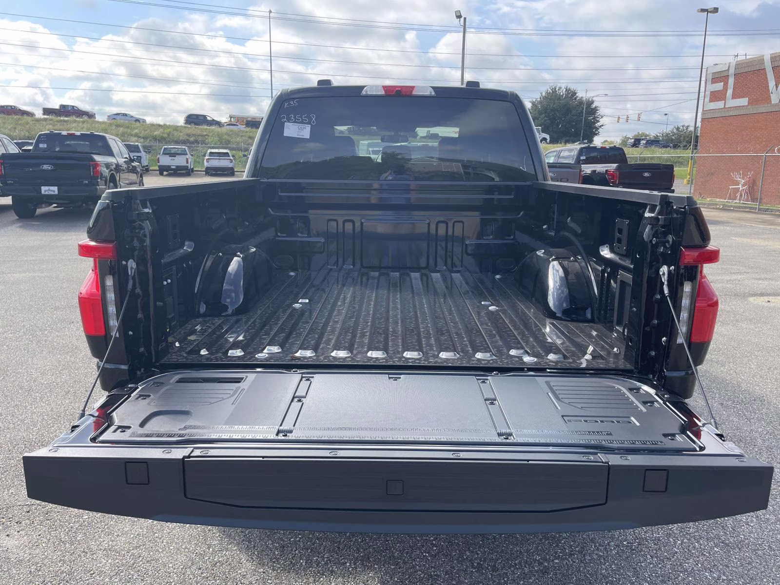 2025 Agate Black Metallic Ford F-150 Lightning Flash AWD Truck