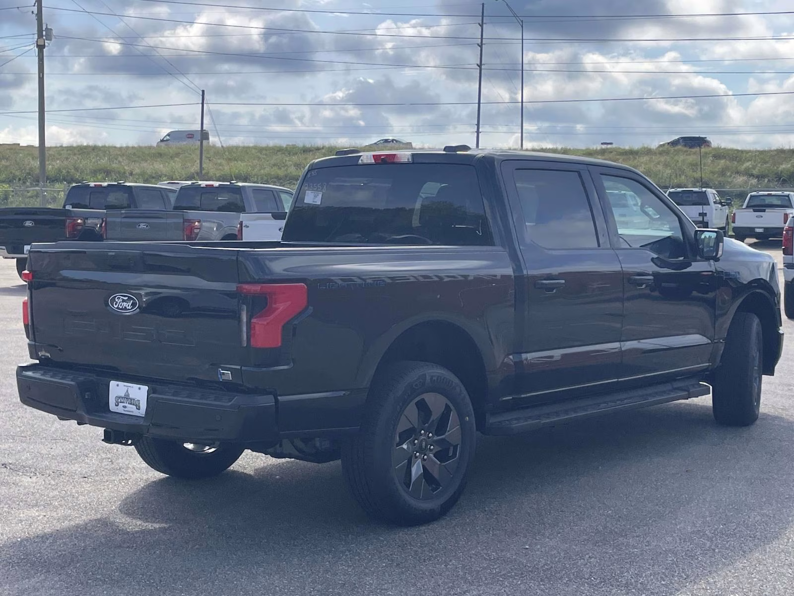 2025 Agate Black Metallic Ford F-150 Lightning Flash AWD Truck