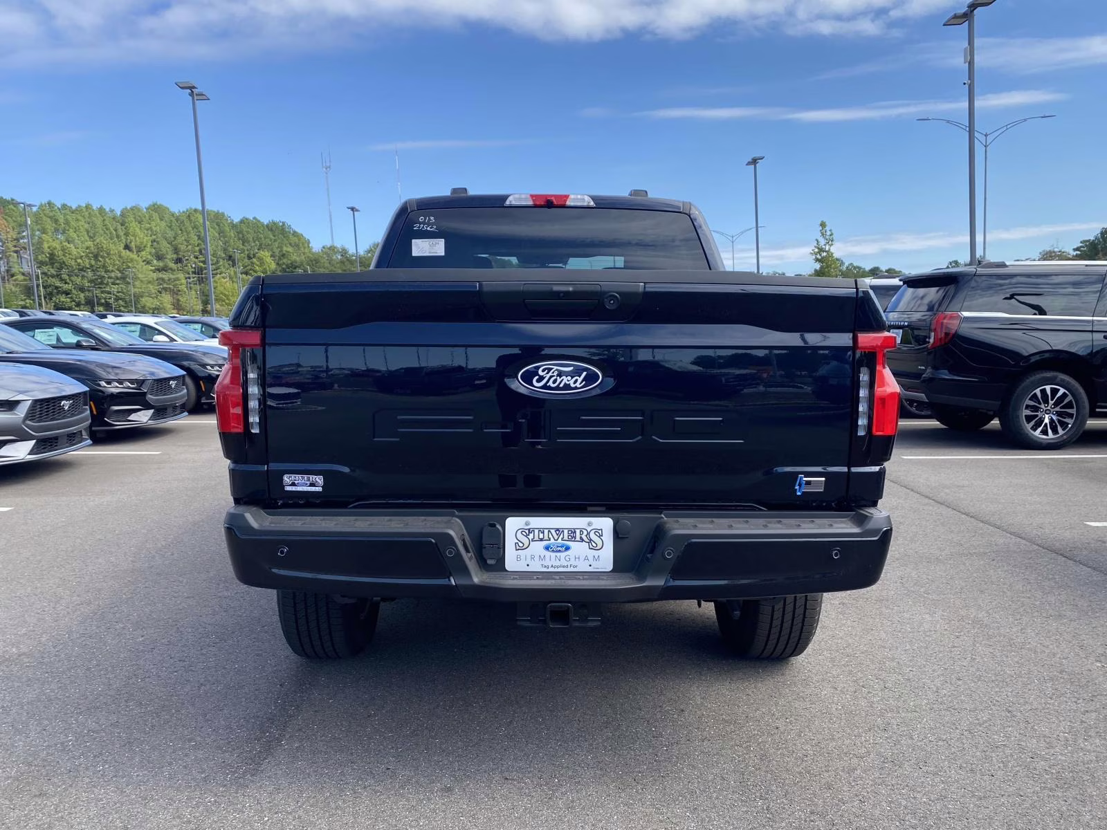 2025 Antimatter Blue Metallic Ford F-150 Lightning Flash AWD Truck