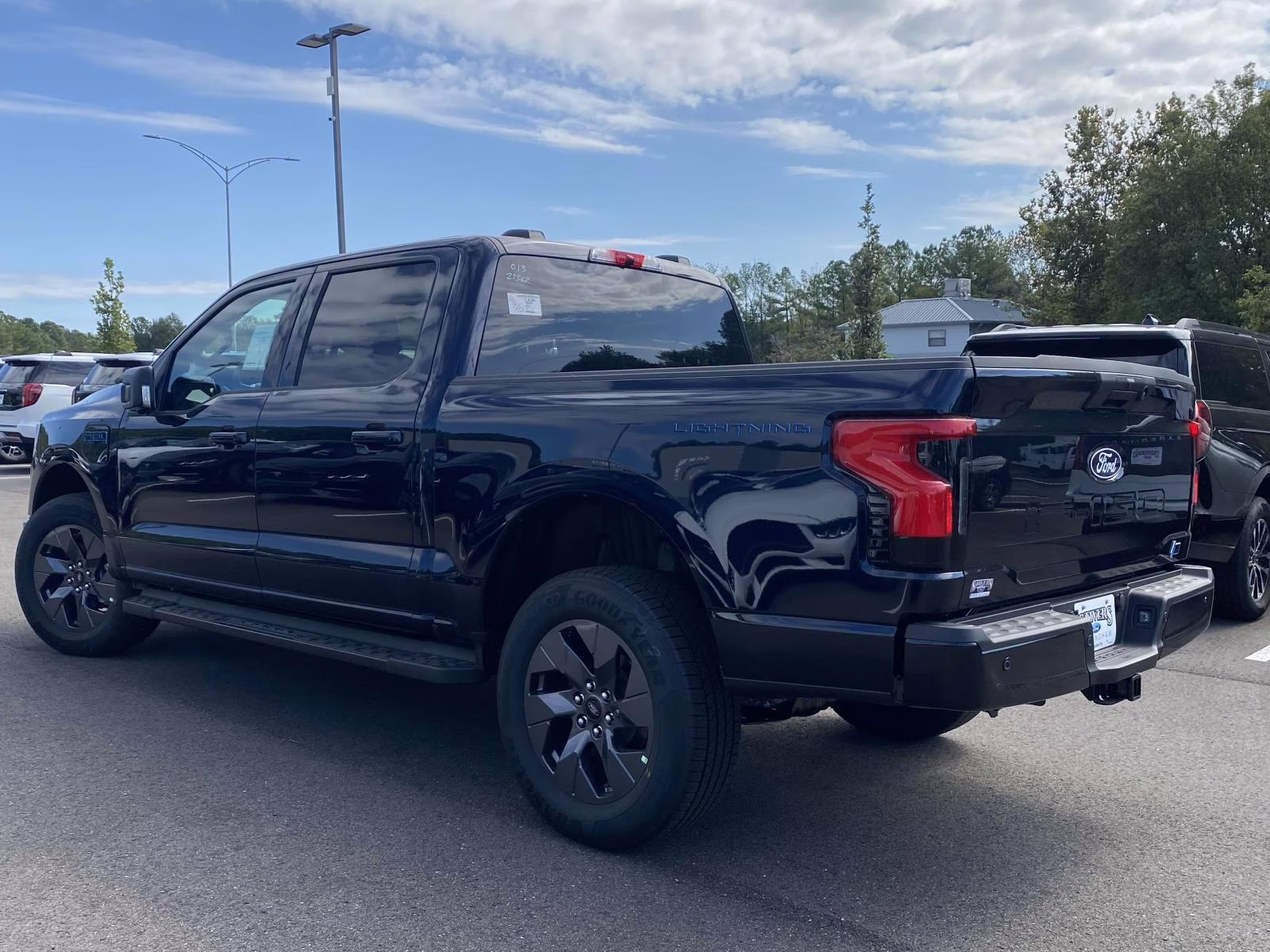 2025 Antimatter Blue Metallic Ford F-150 Lightning Flash AWD Truck