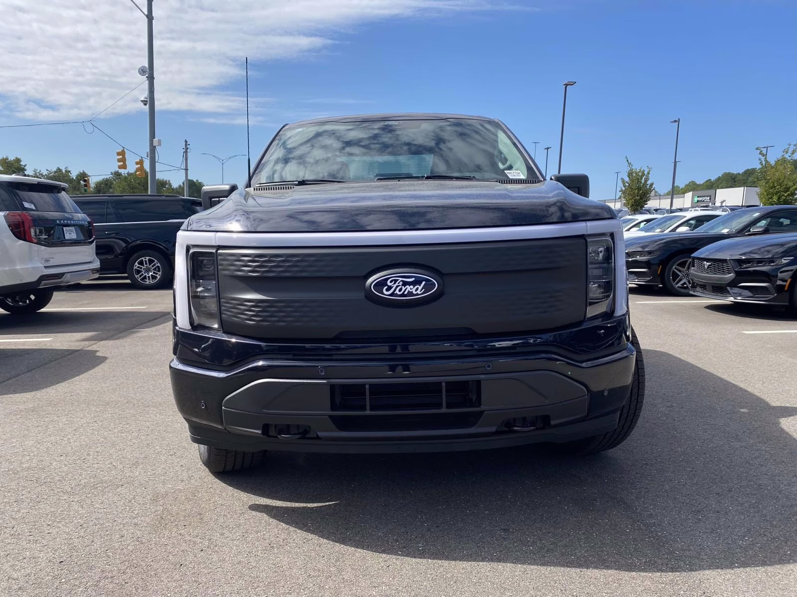 2025 Antimatter Blue Metallic Ford F-150 Lightning Flash AWD Truck