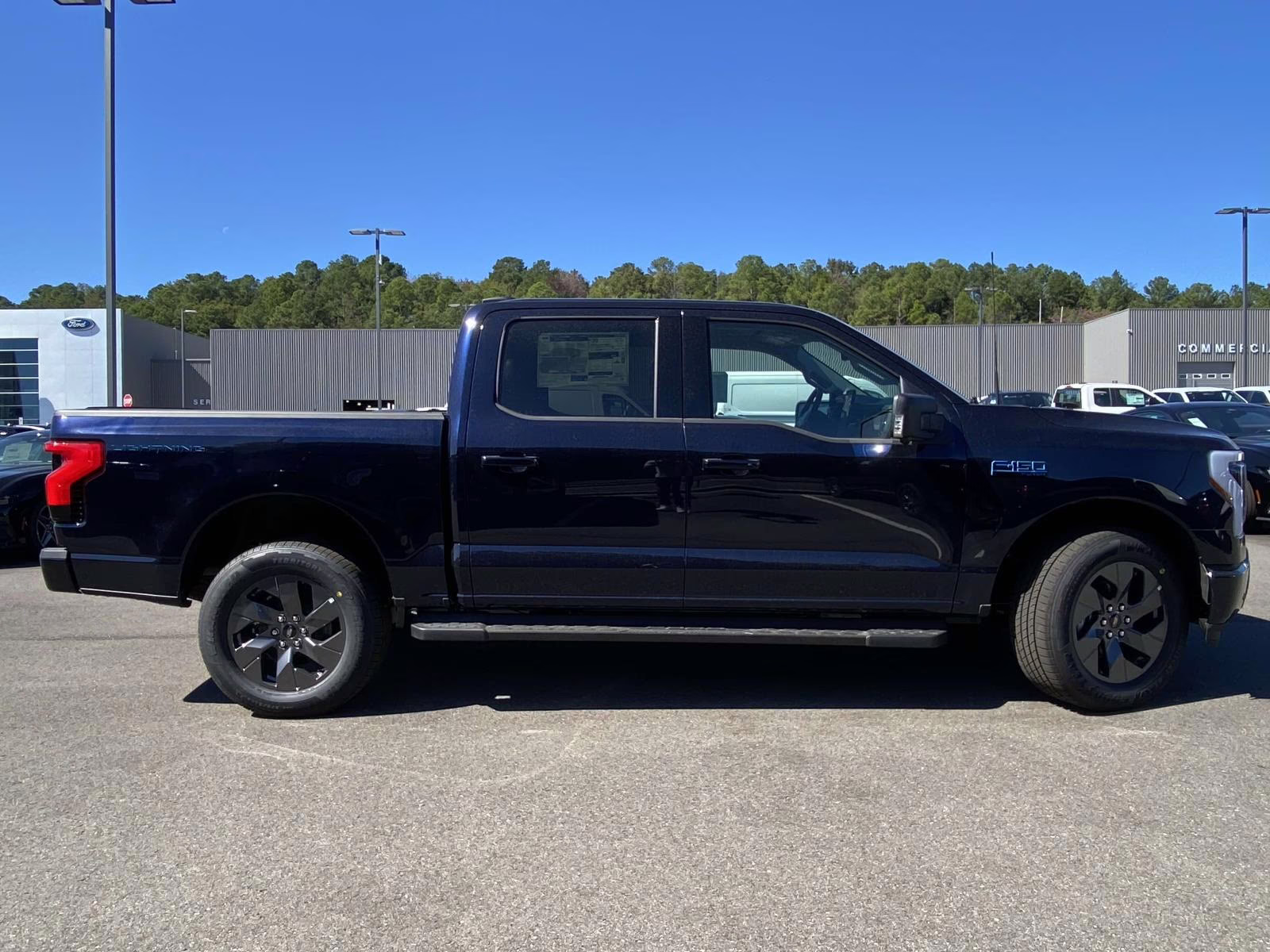 2025 Antimatter Blue Metallic Ford F-150 Lightning Flash AWD Truck