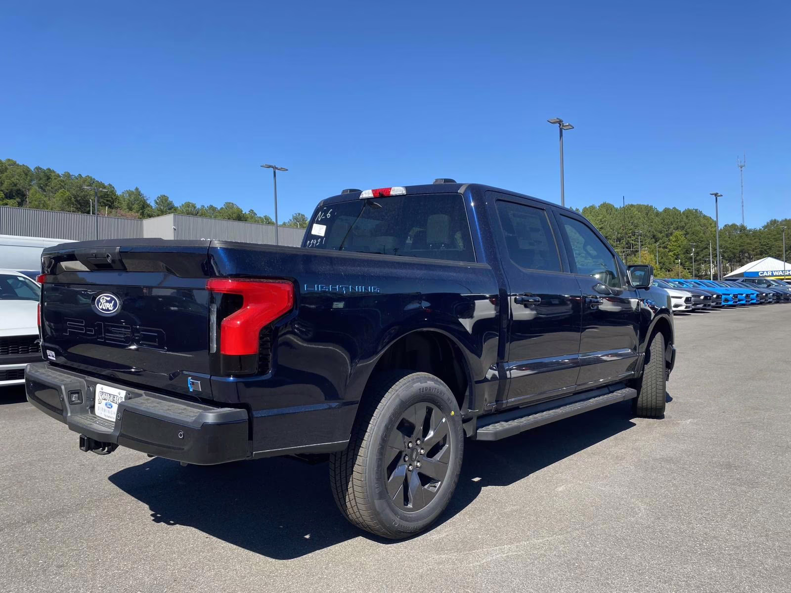 2025 Antimatter Blue Metallic Ford F-150 Lightning Flash AWD Truck