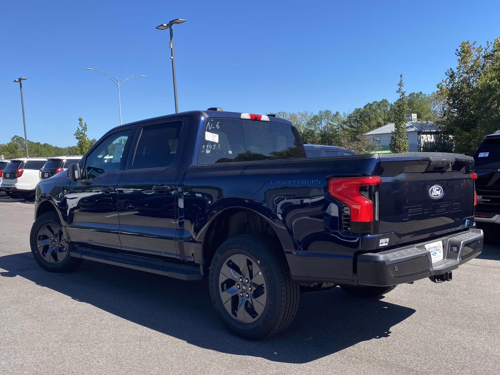 2025 Antimatter Blue Metallic Ford F-150 Lightning Flash AWD Truck
