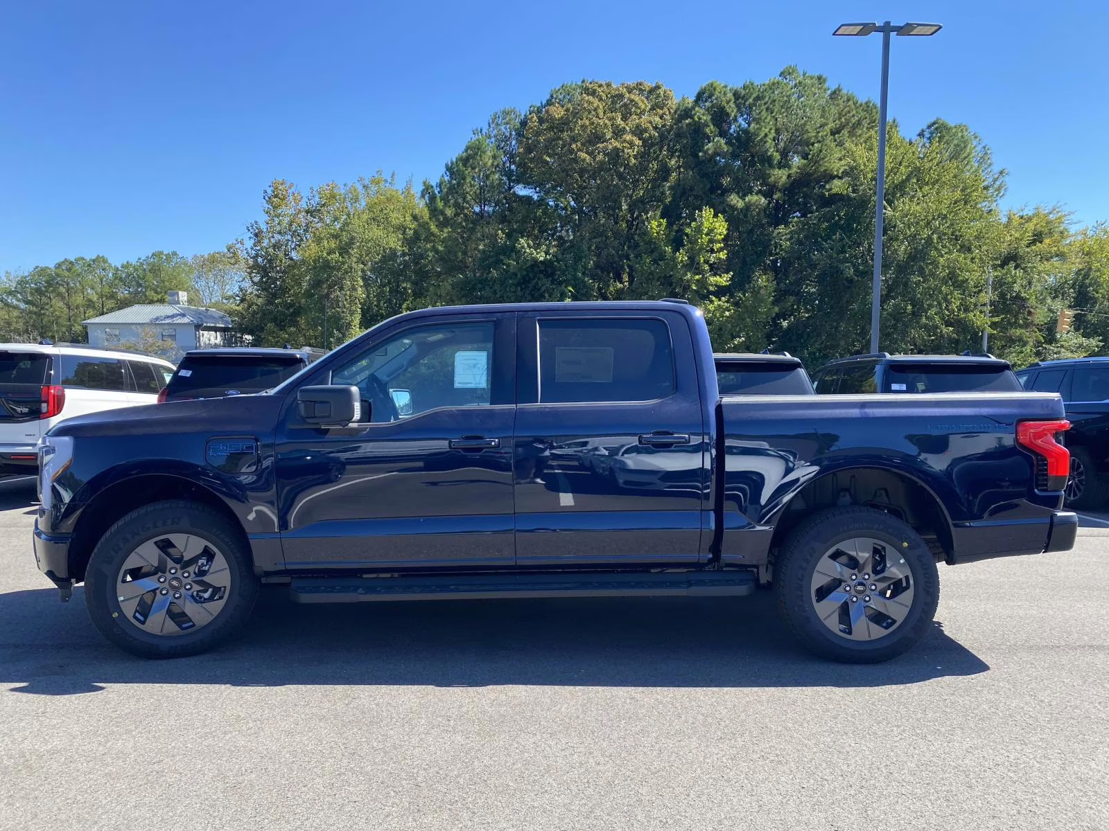 2025 Antimatter Blue Metallic Ford F-150 Lightning Flash AWD Truck