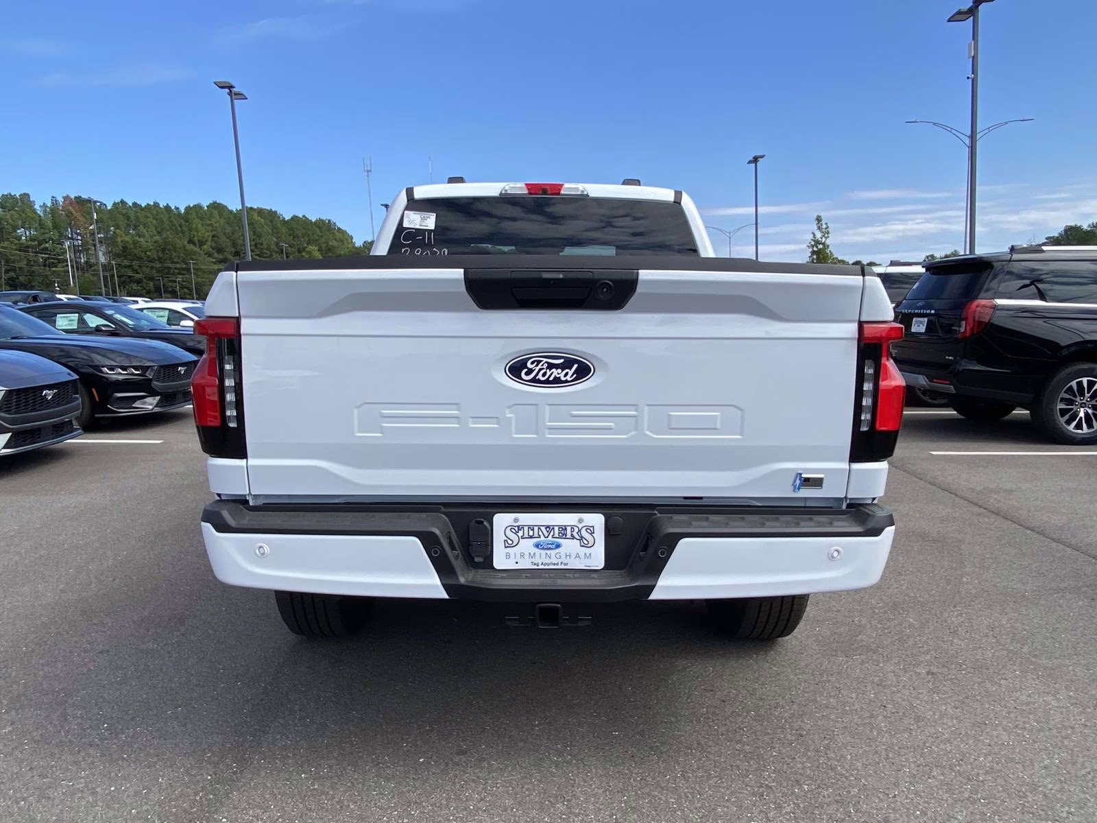 2025 Oxford White Ford F-150 Lightning Flash AWD Truck