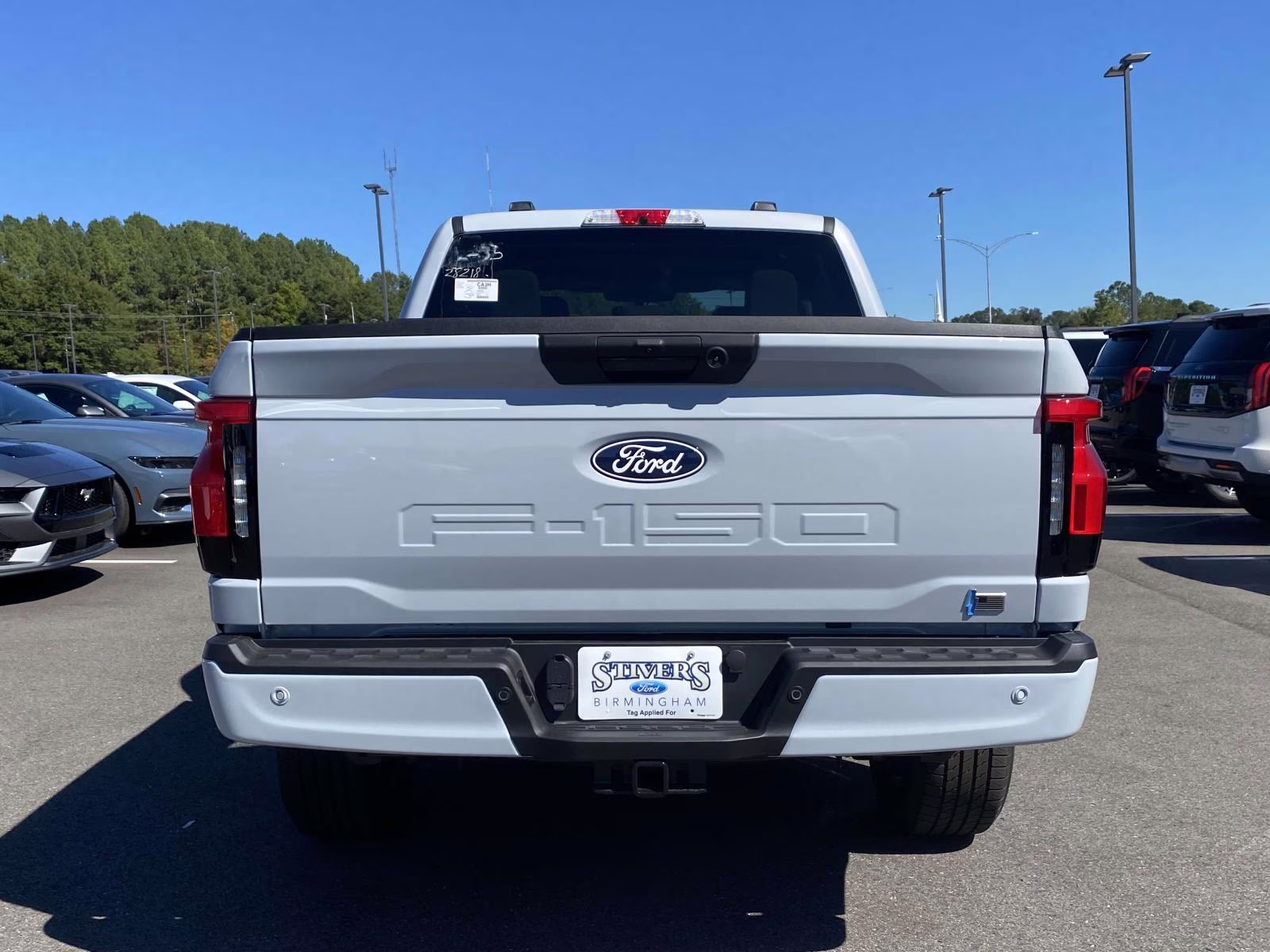 2025 Space White Metallic Ford F-150 Lightning Flash AWD Truck