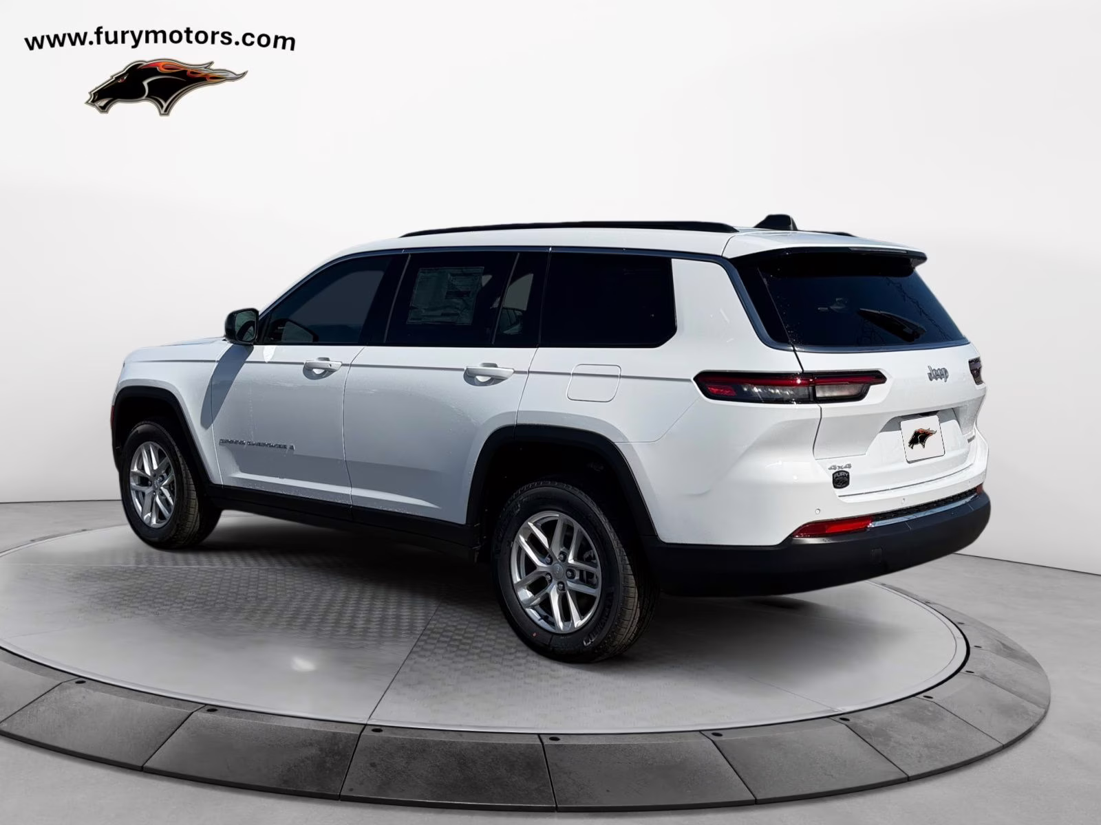 2025 Bright White Clearcoat Jeep Grand Cherokee L Laredo 4X4 SUV