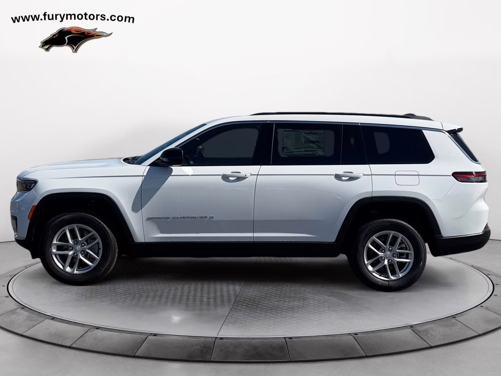 2025 Bright White Clearcoat Jeep Grand Cherokee L Laredo 4X4 SUV