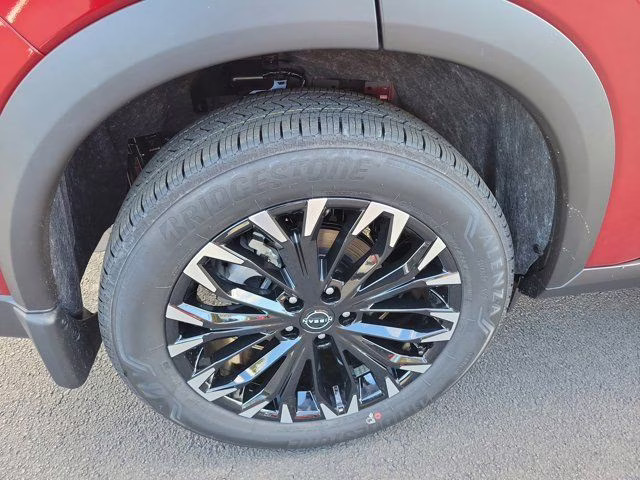 2026 Scarlet Ember Tintcoat Nissan Rogue SV FWD SUV