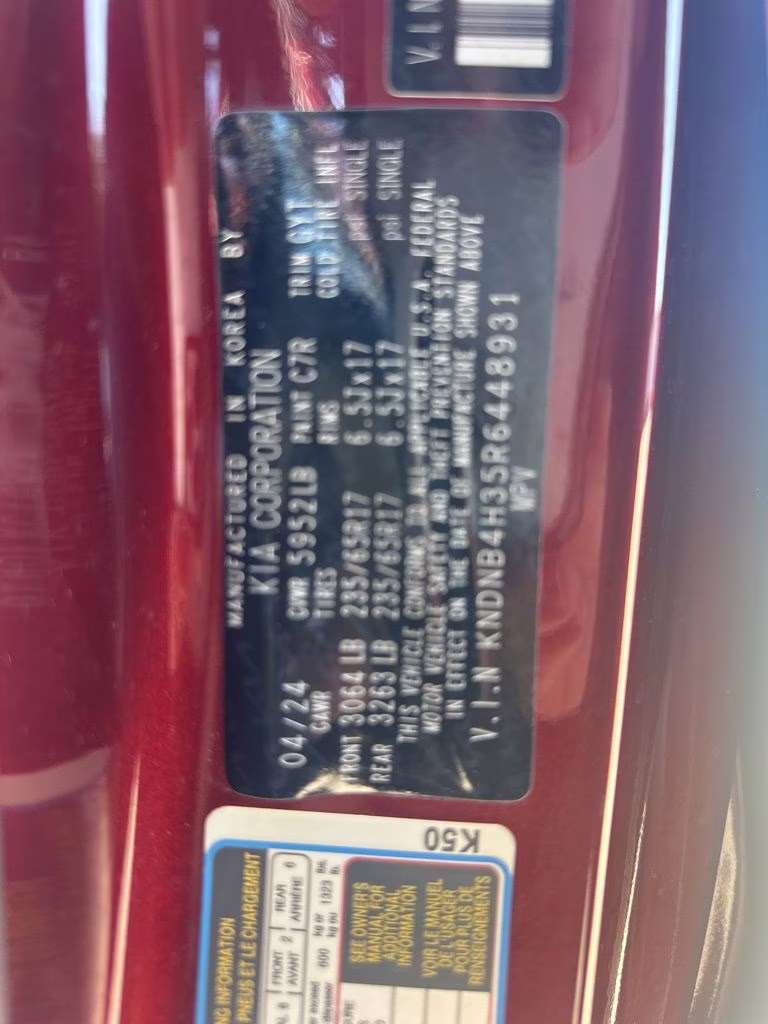 2024 Flare Red Kia Carnival LX FWD Van