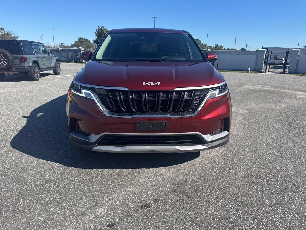 2024 Flare Red Kia Carnival LX FWD Van