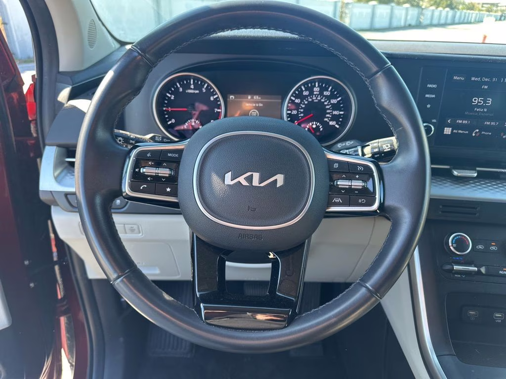 2024 Flare Red Kia Carnival LX FWD Van