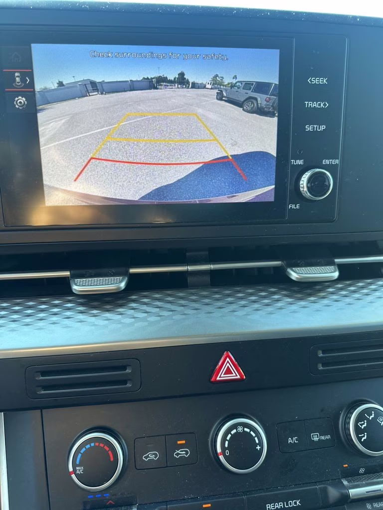 2024 Flare Red Kia Carnival LX FWD Van