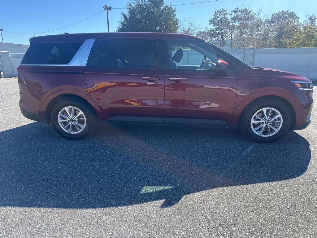2024 Flare Red Kia Carnival LX FWD Van