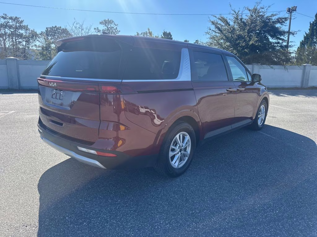2024 Flare Red Kia Carnival LX FWD Van